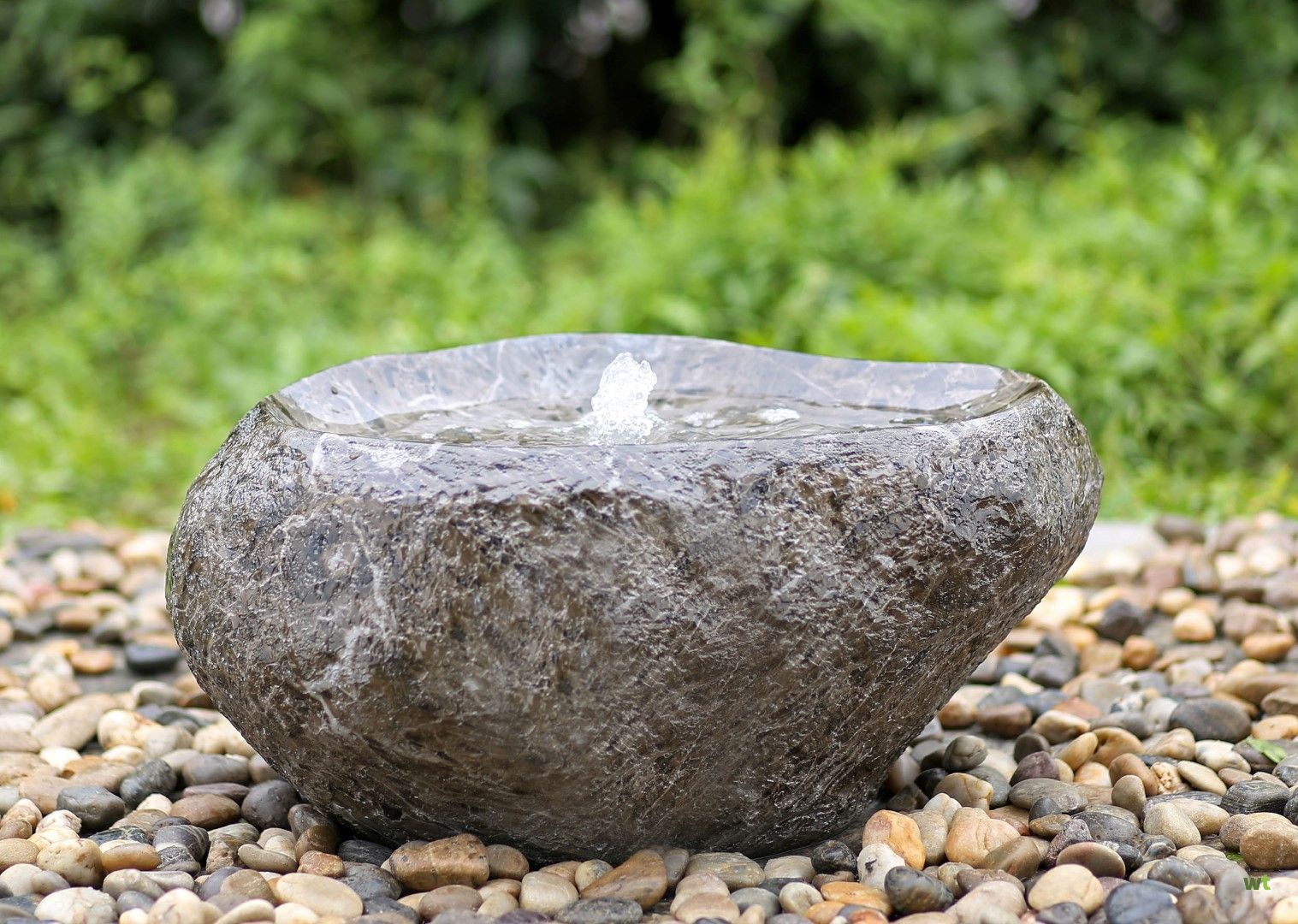 verwennen Vete over het algemeen Waterornament steen met een waterbel plat OWN
